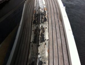 Teak deck, glueing teak slat or teak panel for motor boat in Sardinia. Before Photo2