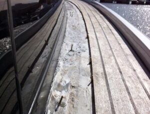 Teak deck, glueing teak slat or teak panel for motor boat in Sardinia. Before Photo3